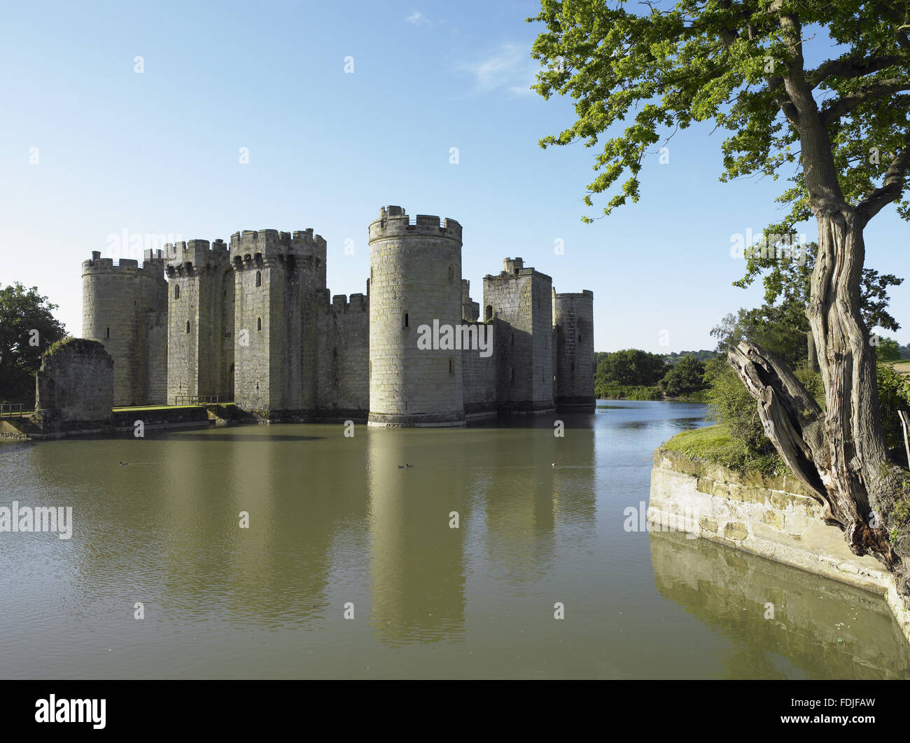 Bodiam Castle, East Sussex, built between 1385 and 1388. The castle replaced Sir Edward Dalyngrigge's manor house during the Hundred Years War when the French were able to attack across the Channel, and could reach Bodiam via the River Rother. Stock Photo