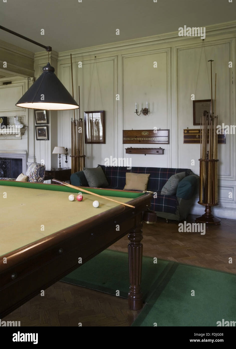 The Billiard Room at Dunham Massey, Cheshire. The billiard table was made  by Gillows of Lancaster c.1810. The wooden panelling in the room is of an  eighteenth-century pattern painted a "stone white"