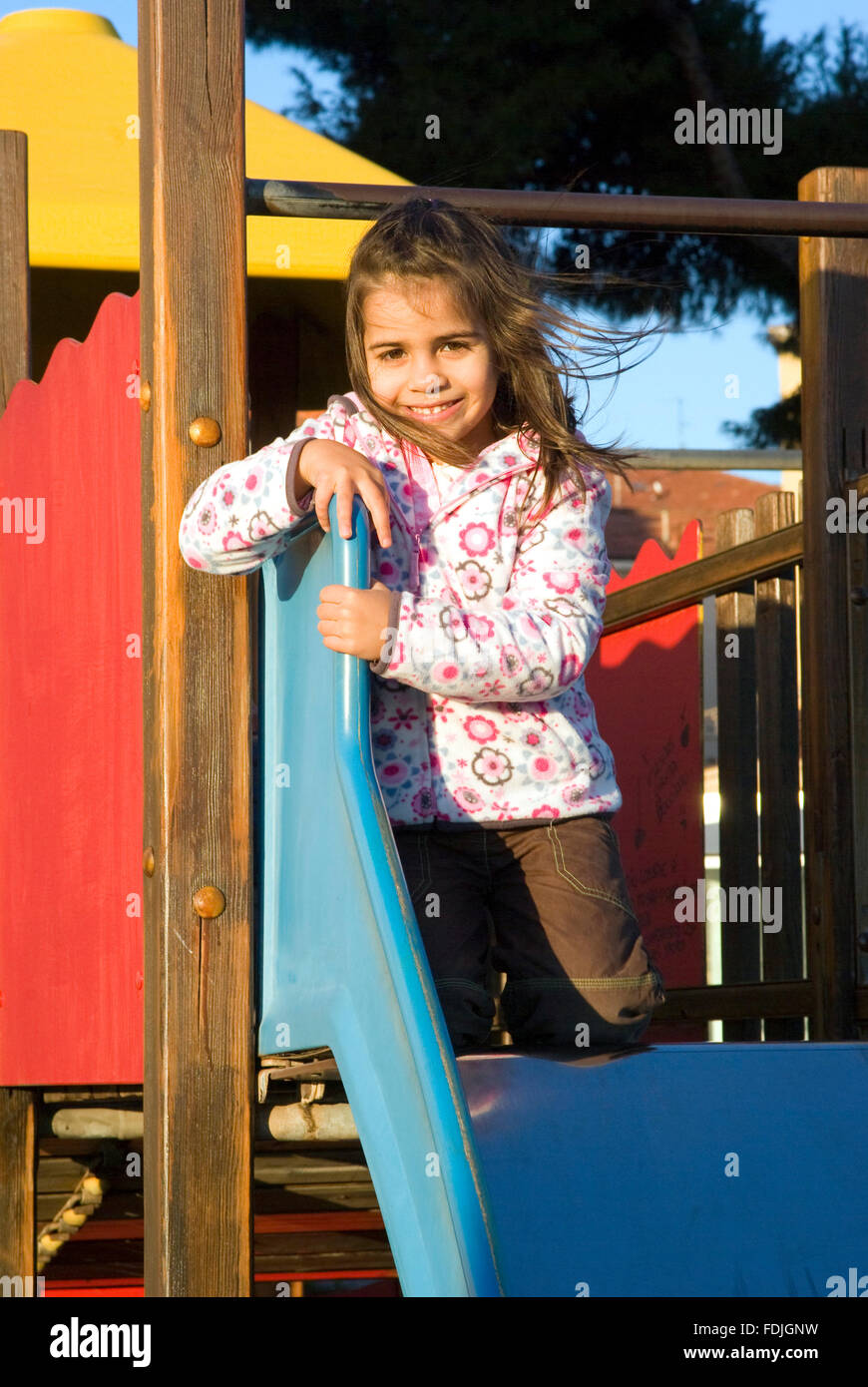 Girl playing at the playground Stock Photo
