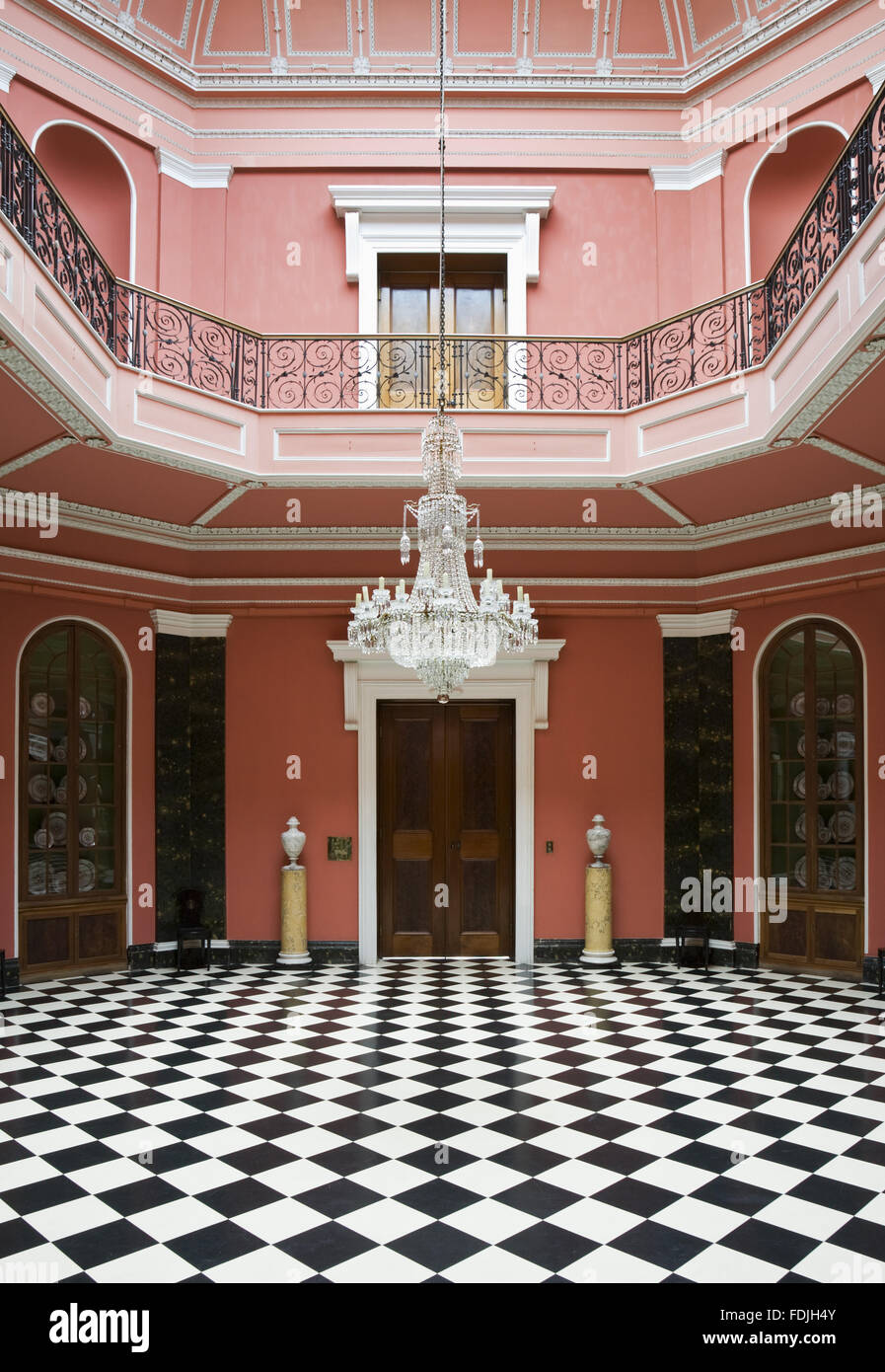 The Hall at Mount Stewart House, Co. Down, Northern Ireland. The room is a vast octagon with painted Ionic columns and was designed by William Vitruvius Morrison in classical style. Stock Photo