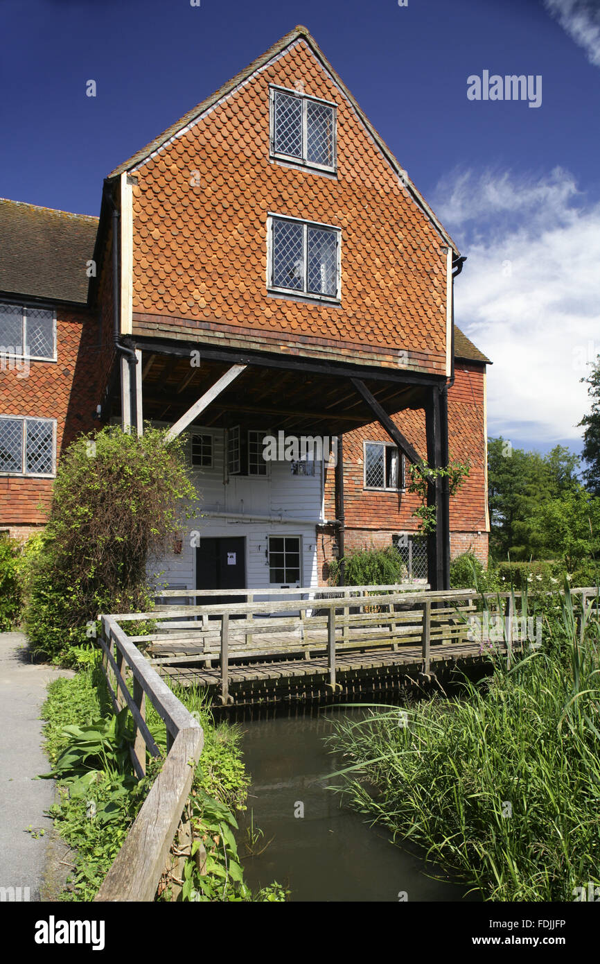 Shalford Mill on the Tillingbourne river, a tributary of the River Wey, Surrey. The watermill is eighteenth century and is one of the properties presented to the National Trust by the Ferguson Gang. Stock Photo