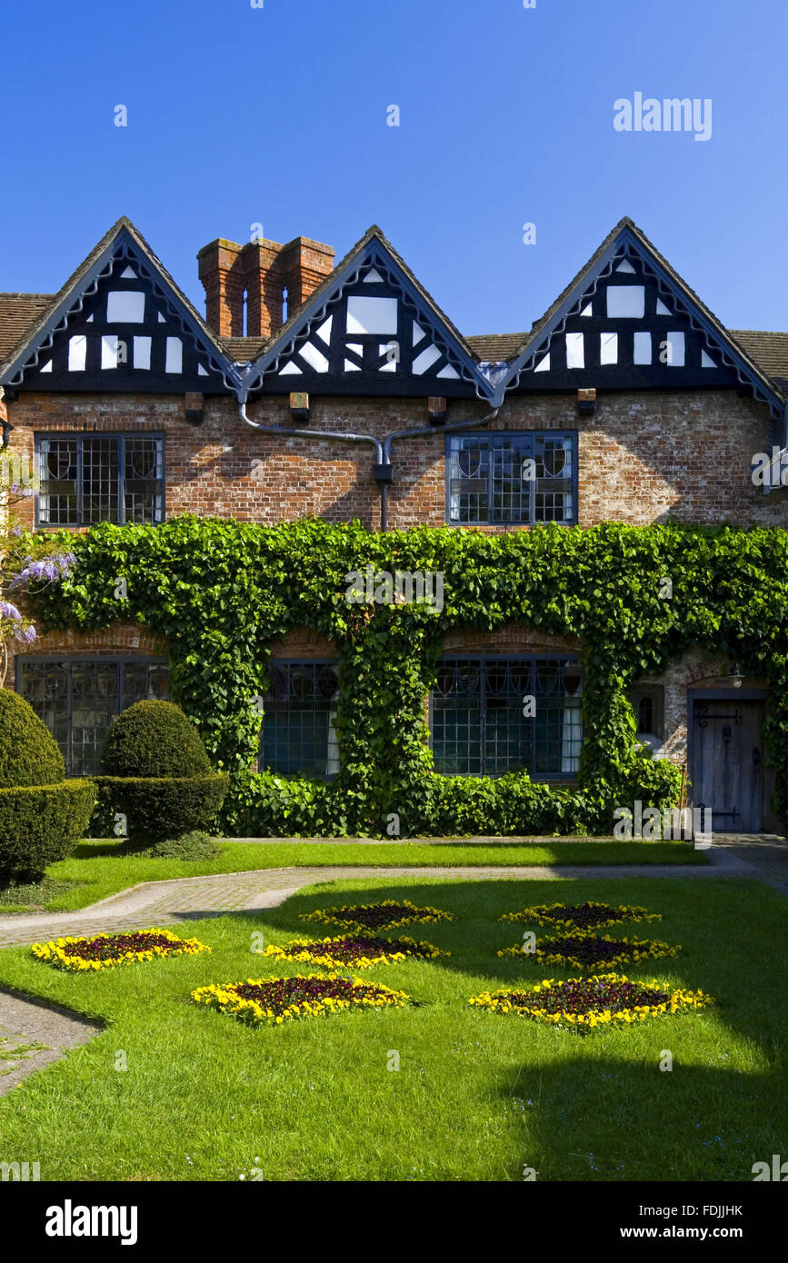 The Courtyard at Baddesley Clinton, Warwickshire. The Courtyard garden was created in 1889 by Edward Heneage Dering. Stock Photo