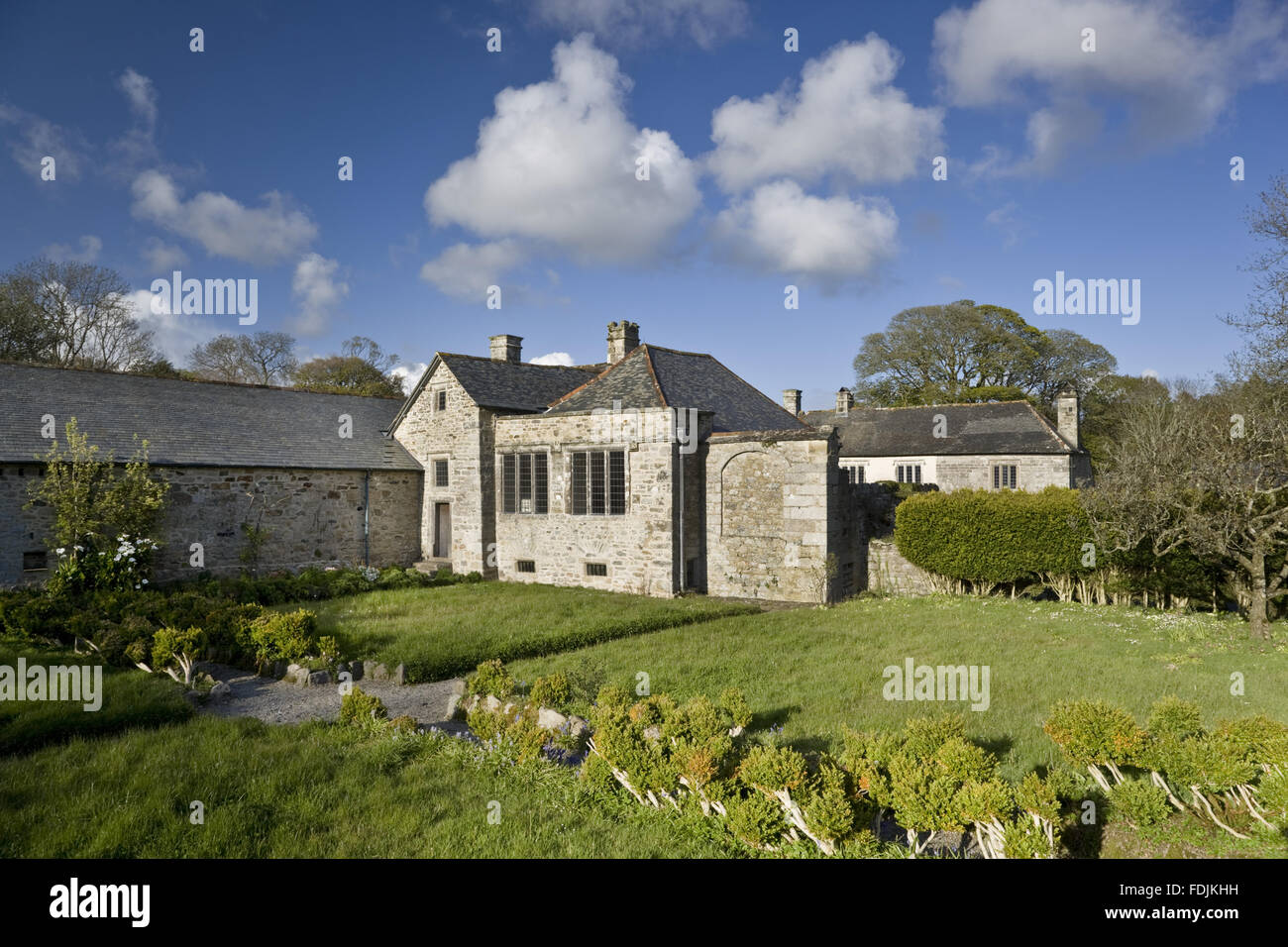 The medieval garden in April at Godolphin House, once the home of Queen Anne's Lord High Treasurer, Sidney Godolphin, near Helston, Cornwall. The original fortified house was replaced in the fifteenth-century and later additions made it the finest house i Stock Photo