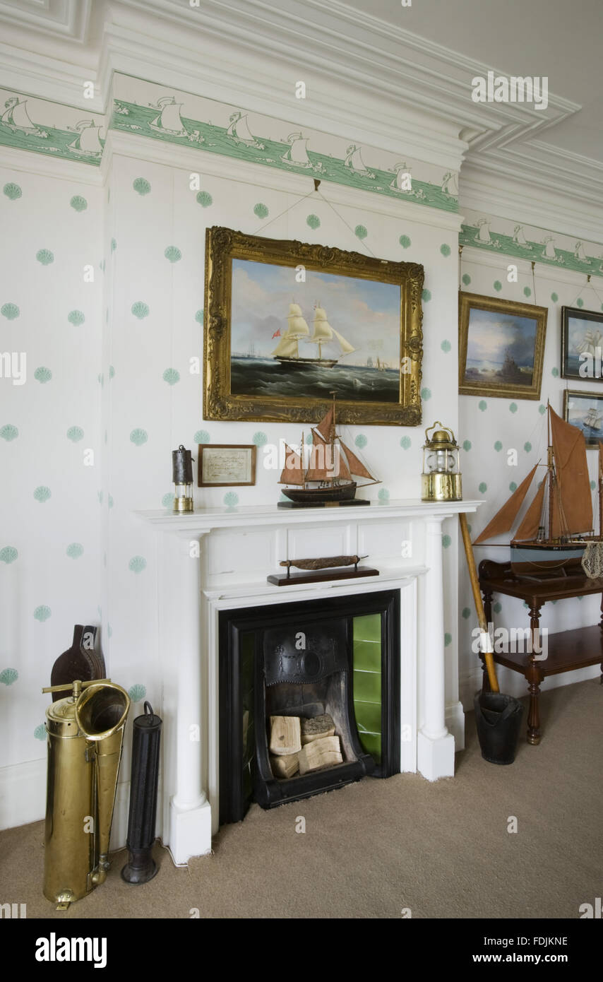 Model ships, nautically-themed paintings and other maritime memorabilia in the Maritime Room at Overbeck's, Sharpitor, Devon where the scientist Otto Overbeck lived from 1928 until 1937. Stock Photo