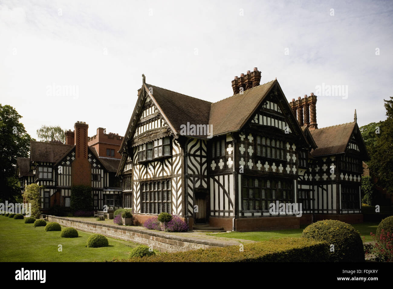 Wightwick Manor, Wolverhampton, West Midlands, designed by Edward Ould for the Mander family and built between 1887-8. It is in an 'Old English' style using a mixture of timber-framing with plaster, red brick and stone. Stock Photo