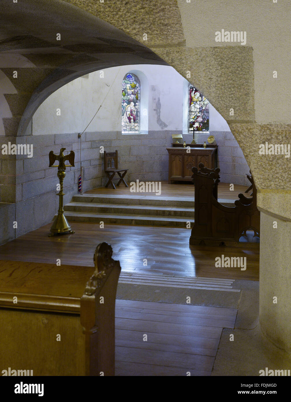 The Chapel at Castle Drogo, Devon. The Chapel was created in the space  within the undercroft of the building with walls six feet deep and small  windows. The three-bay room is groin-vaulted