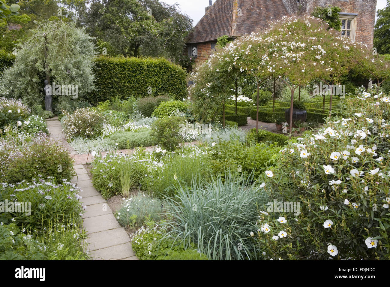 The White Garden in June at Sissinghurst Castle Garden, near Cranbrook, Kent. Stock Photo