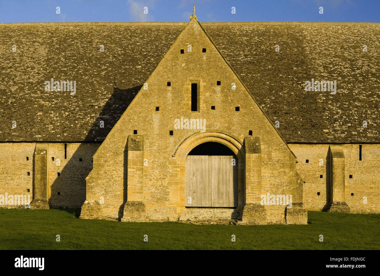 One of the projecting porches of the mid-thirteenth century monastic Great Coxwell Barn near Faringdon in Oxfordshire. Stock Photo