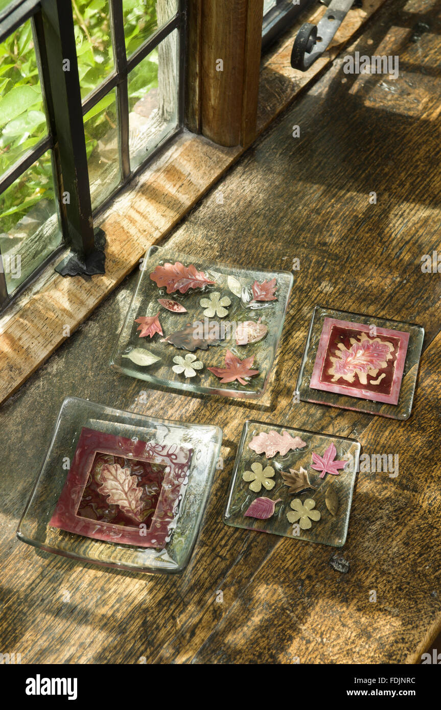 Decorative glass coasters. Stock Photo