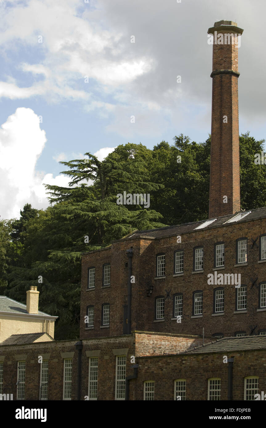 The mill building and chimney at Quarry Bank Mill, Styal, Cheshire. The mill was founded in 1784 and produced cotton until the 1950s. Stock Photo