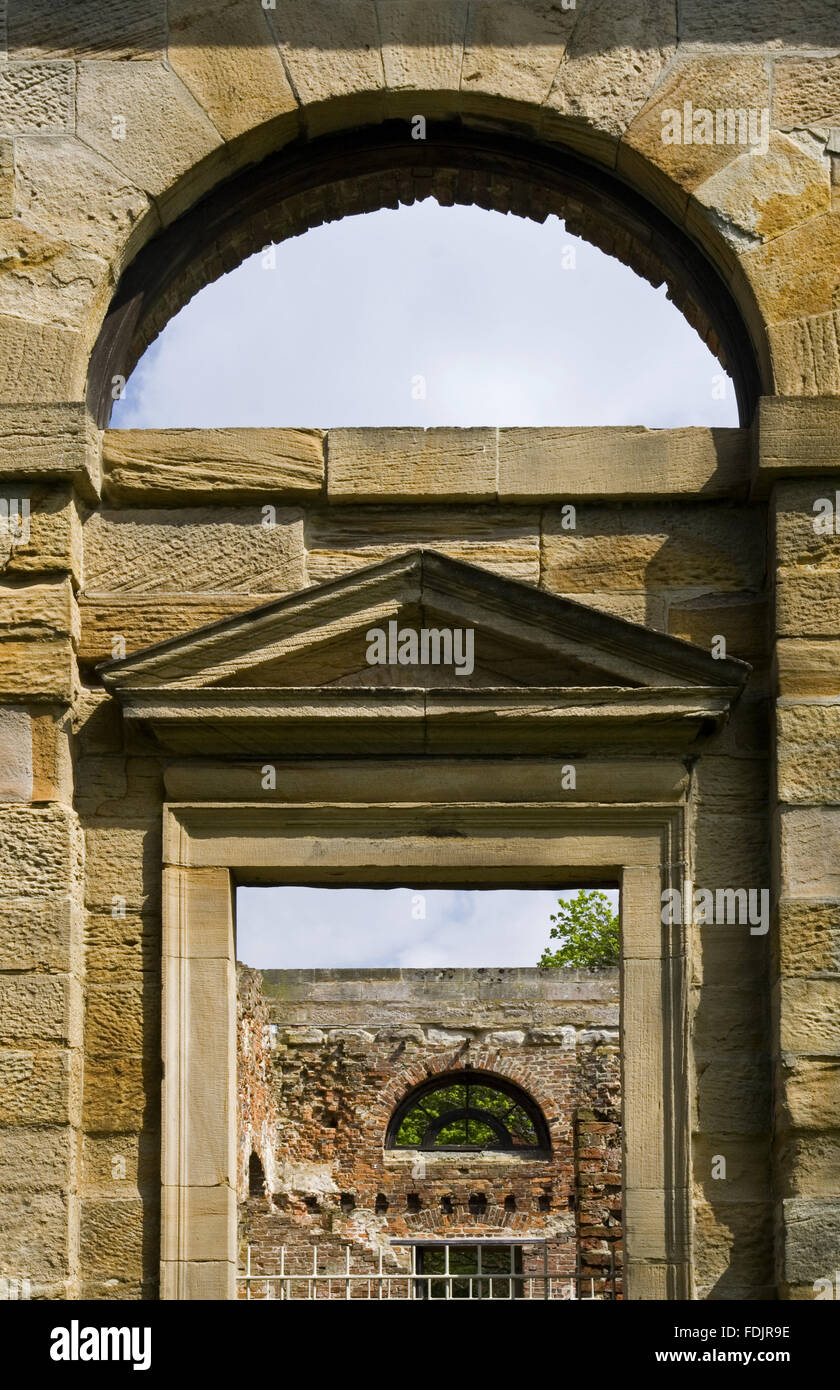 View through the arches and doorway of the Orangery, which was begun in 1772 to a design attributed to James Paine, at Gibside, Newcastle upon Tyne. George Bowes inherited the estate in 1722 and landscaped the grounds and created buildings around Gibside Stock Photo
