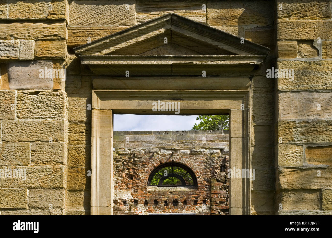 Pediment detail of the Orangery, which was begun in 1772 to a design attributed to James Paine, at Gibside, Newcastle upon Tyne. George Bowes inherited the estate in 1722 and landscaped the grounds and created buildings around Gibside Hall. Stock Photo
