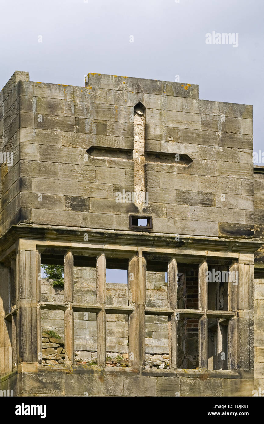 Close view of architectural detail on the facade of Gibside Hall, Newcastle upon Tyne. The house was built between 1603 and 1620, but the parapet with huge crosses replaced the upper floor in 1805. Stock Photo