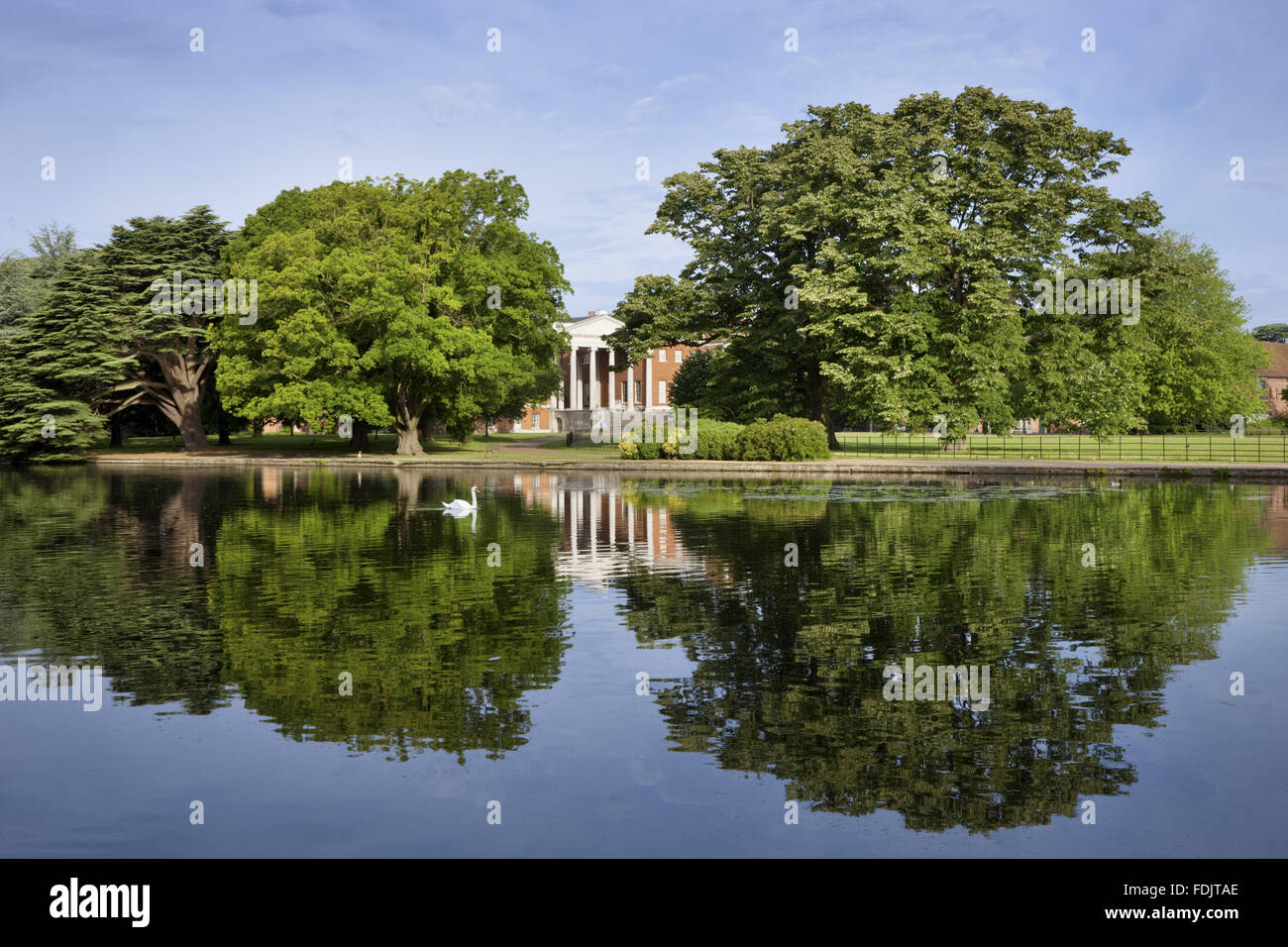 View across the lake towards the east front with the 'transparent' portico at Osterley, Middlesex. The house, originally Elizabethan, was remodelled in 1760 - 80 by Robert Adam. The lake was created during the transformation of the formal garden into land Stock Photo