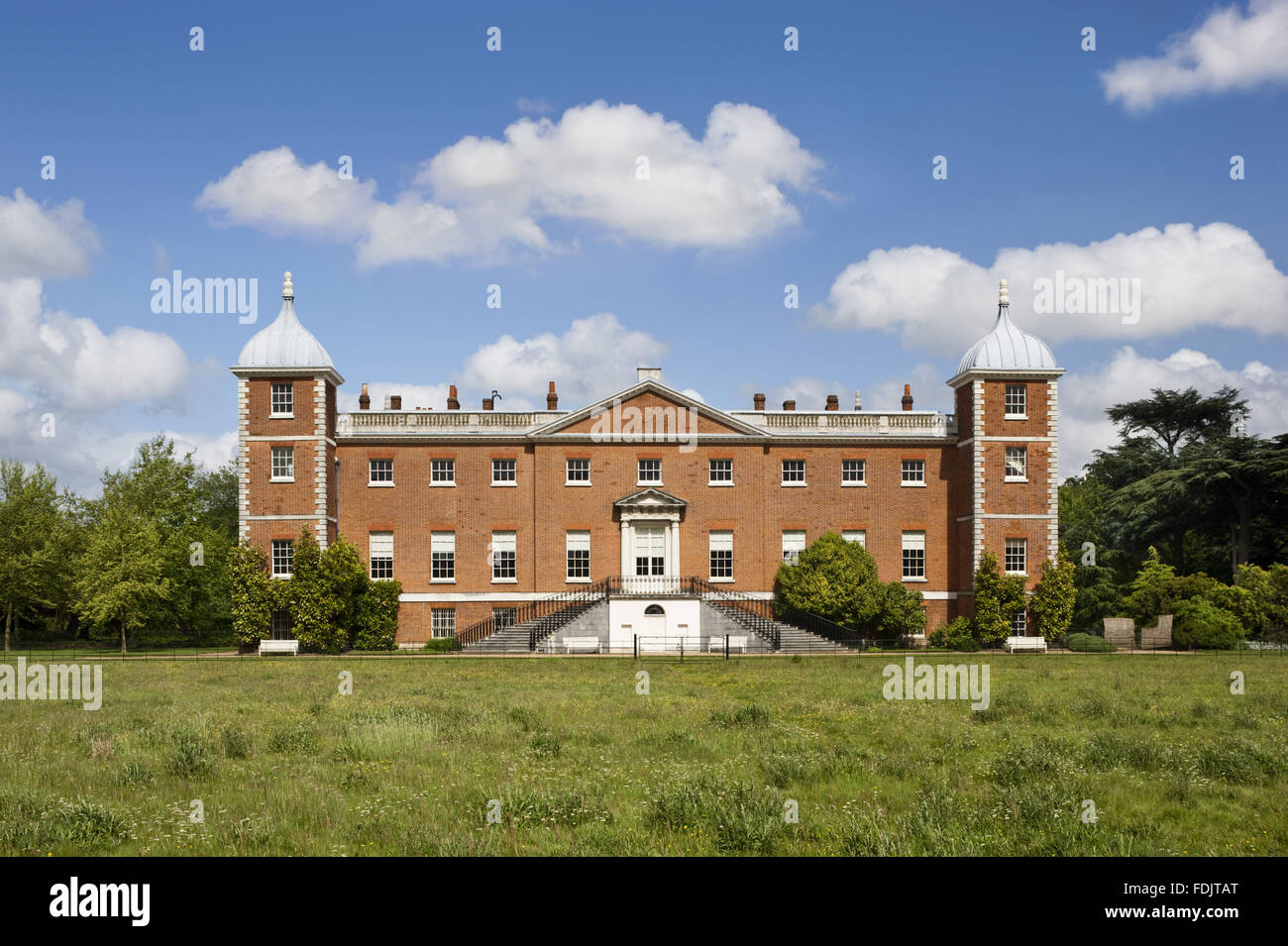 The west or garden front of the house with curved stairs at Osterley, Middlesex. The house was originally Elizabethan, and remodelled in 1760 - 80 by Robert Adam. Stock Photo