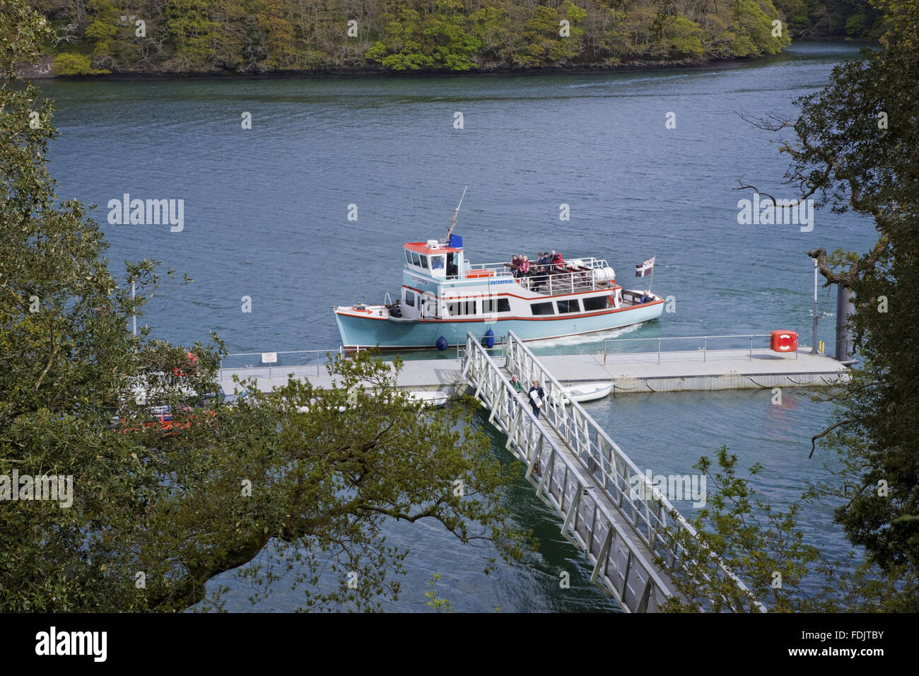 The Foot Ferry on the River Fal which brings visitors to the landing stage at Trelissick Garden, Cornwall. Stock Photo