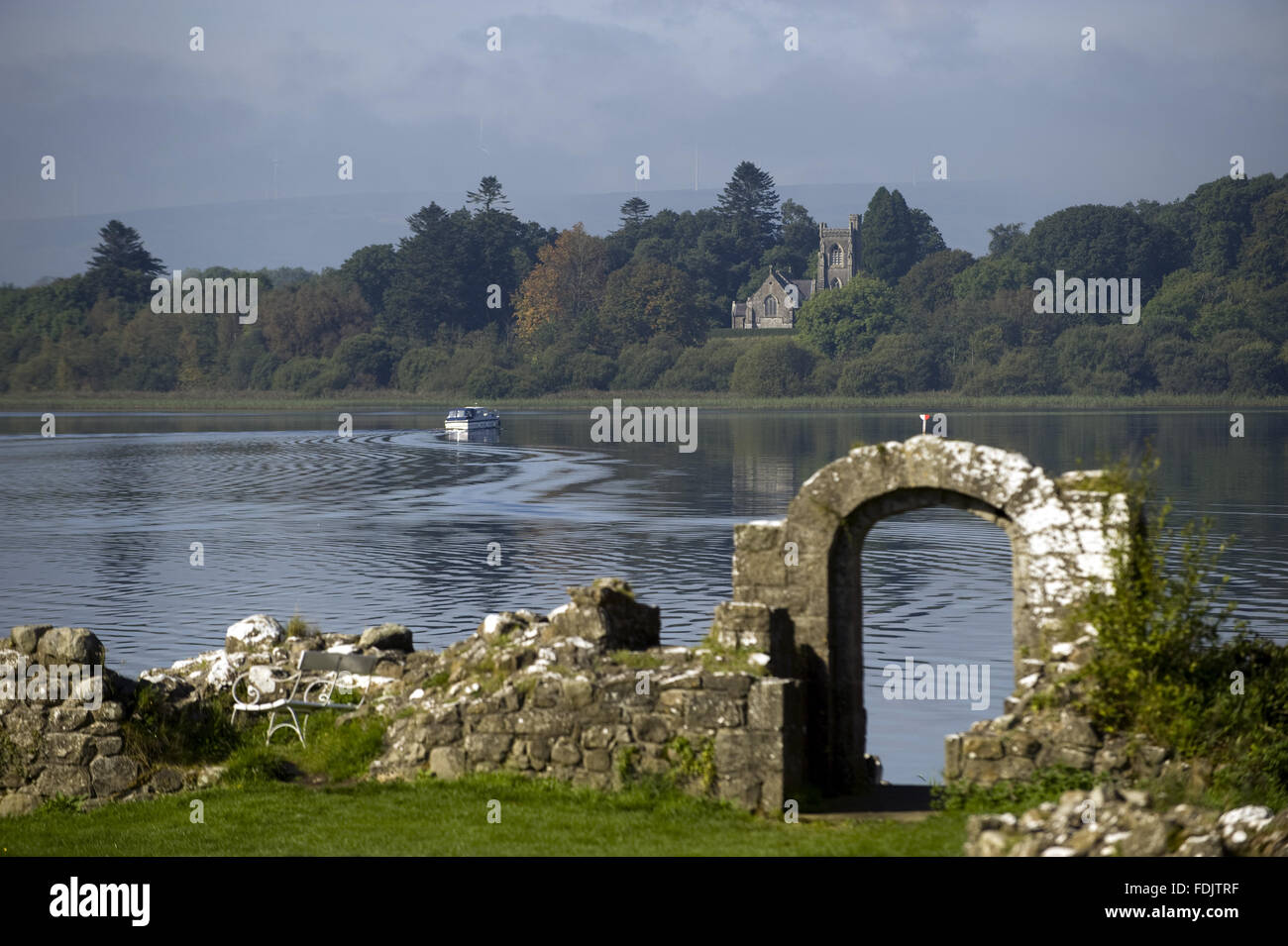 A view of Holy Trinity church (not National Trust) on the Derryvore peninsula across Lough Erne at Crom, Co. Fermanagh, Northern Ireland. Stock Photo