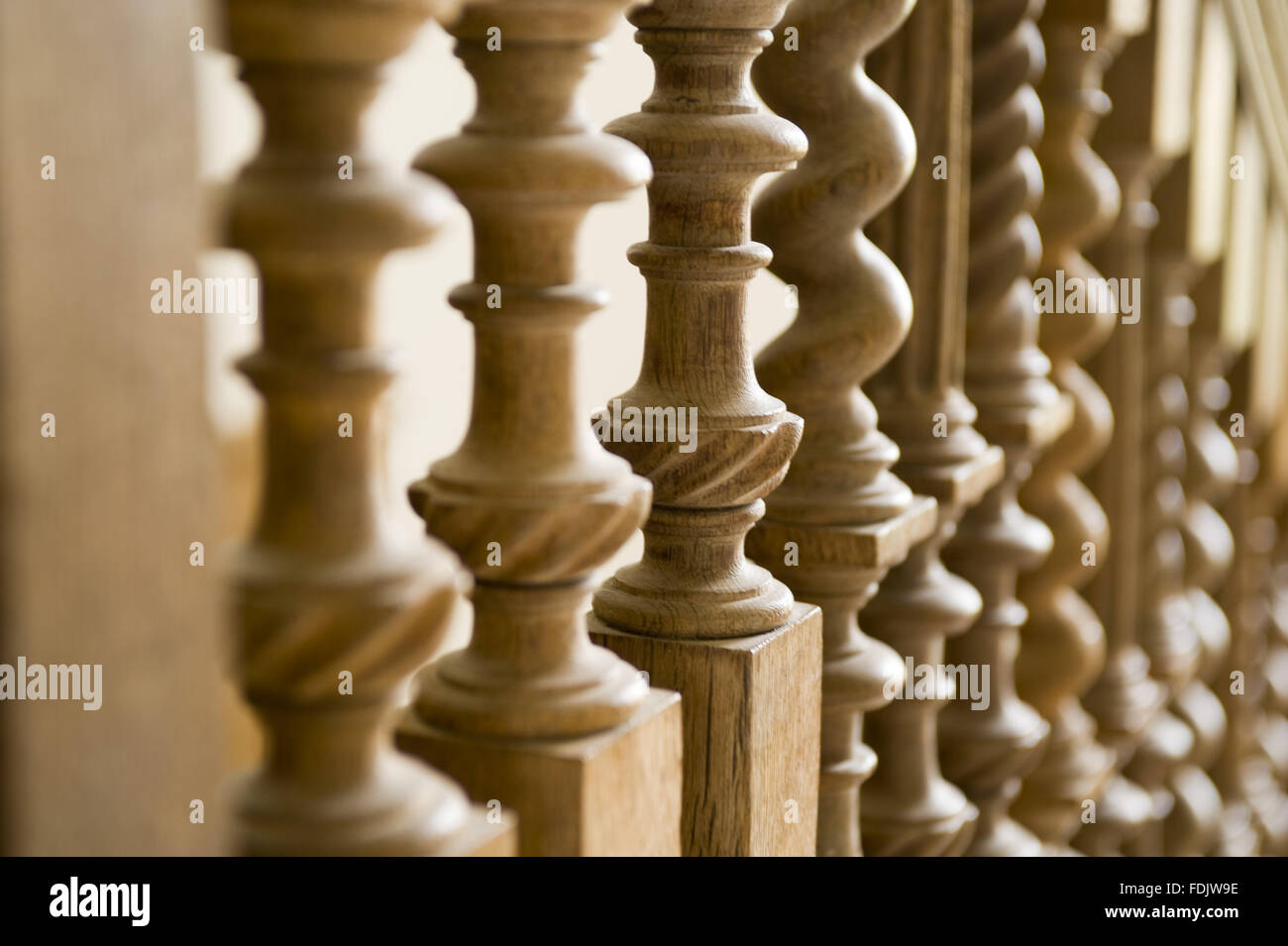 Turned wooden spindles on the North Wing Staircase at Melford Hall, Suffolk. Stock Photo