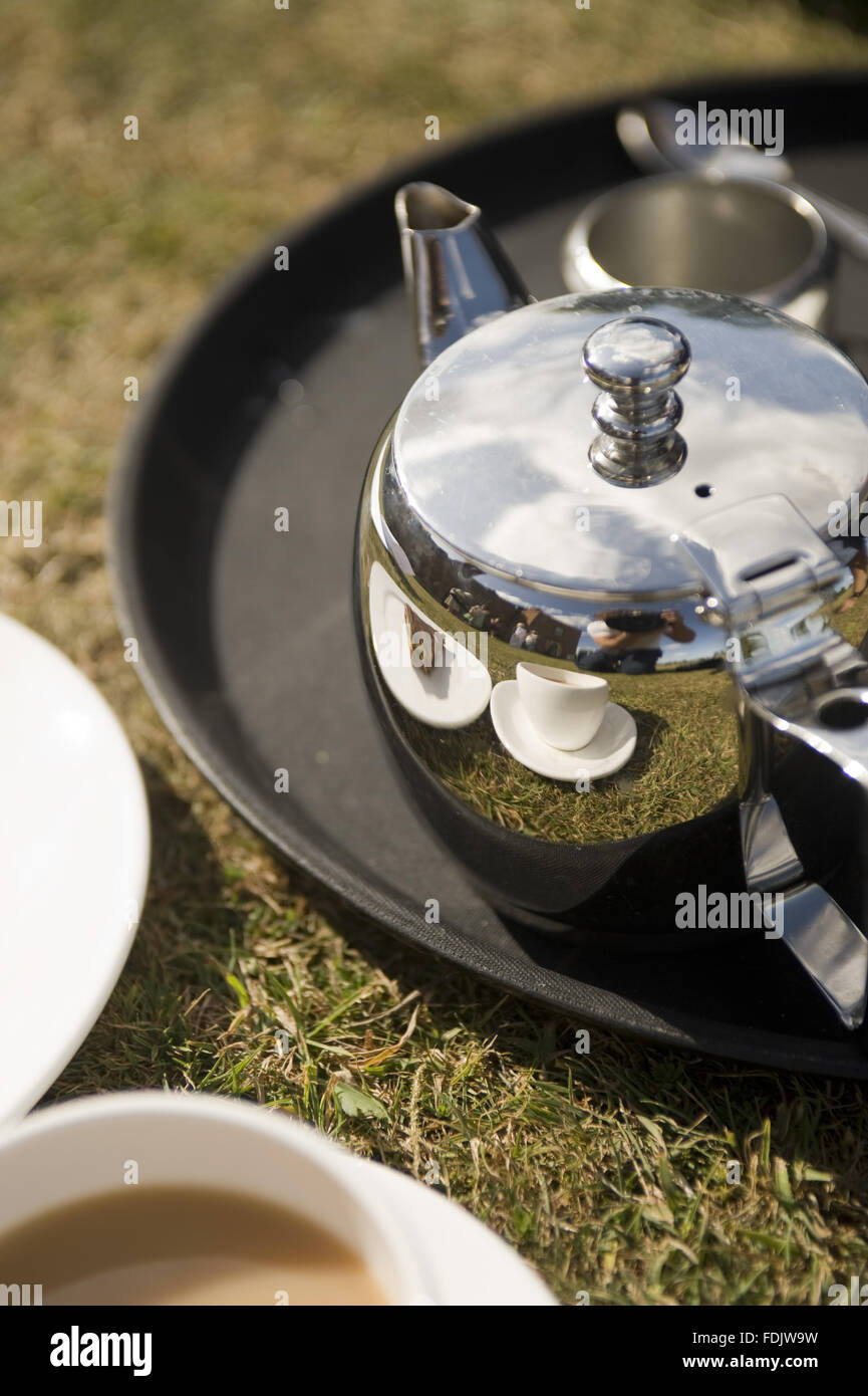 Close view of a teapot for afternoon tea on the lawn at Melford Hall