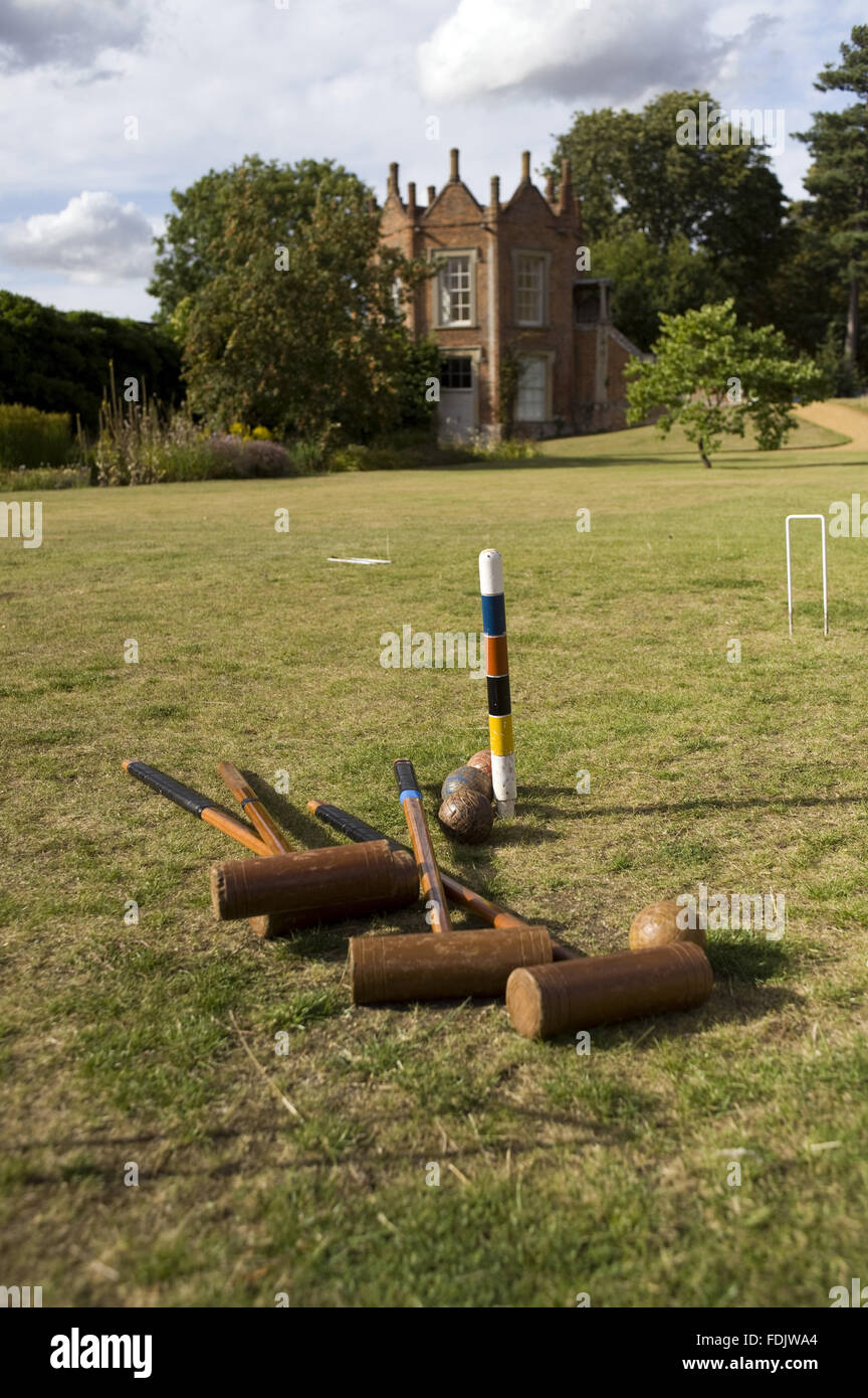 Croquet equipment on the lawn with the Pavilion behind at Melford Hall