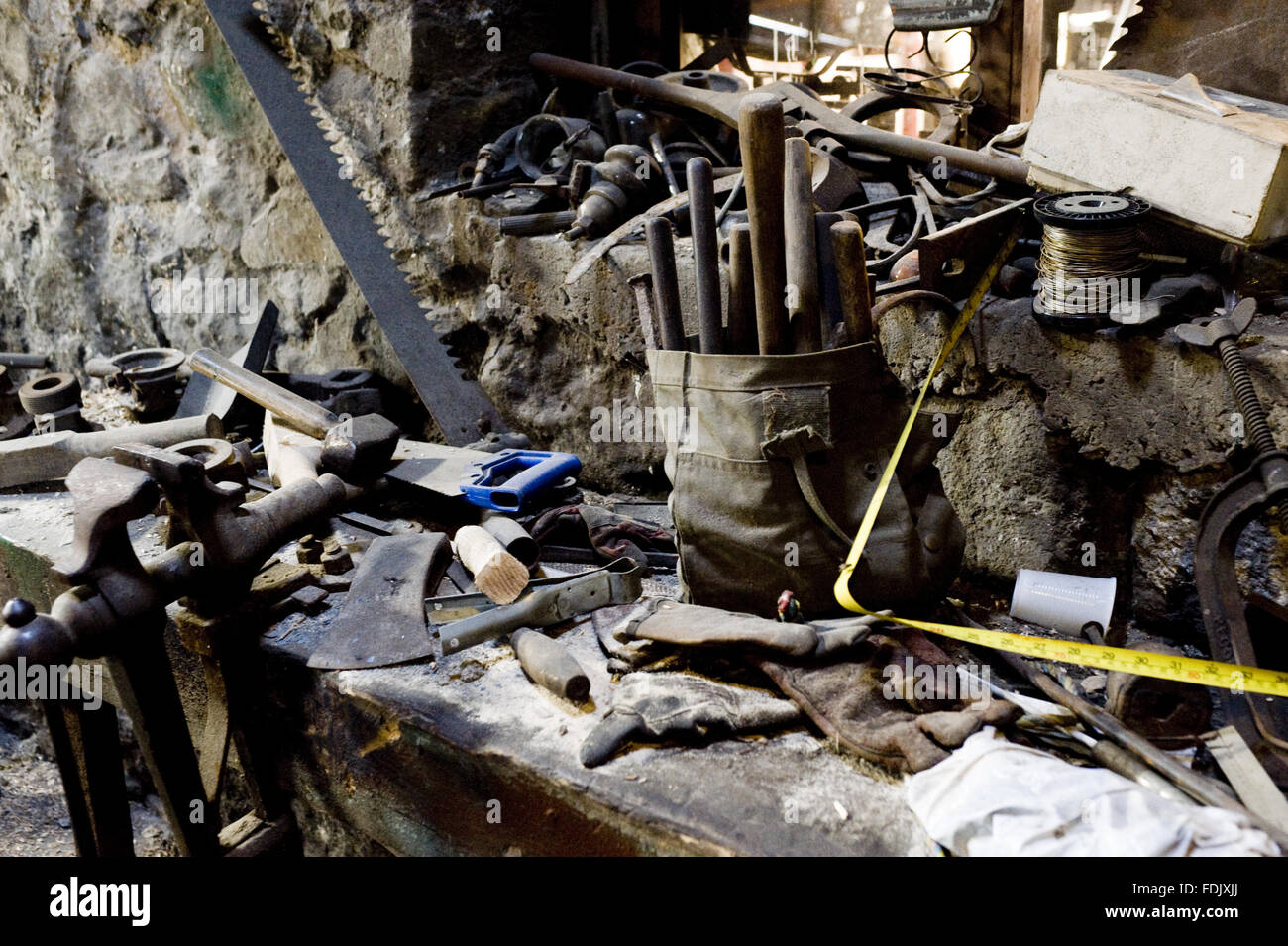 Old tools and equipment on a workbench at Patterson's Spade Mill, Co
