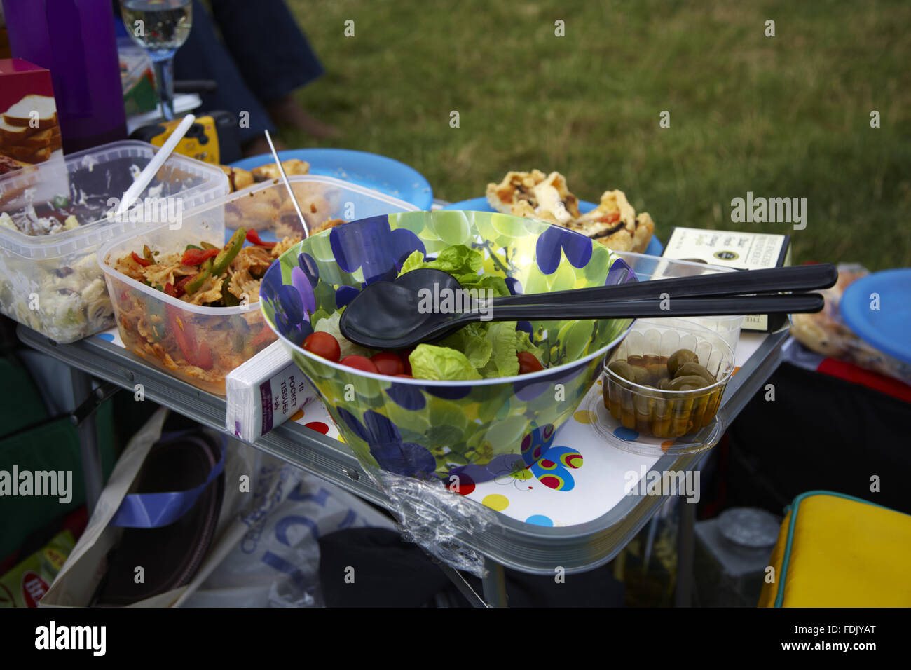 Picnic table with food at an outdoor music concert at Blickling Hall