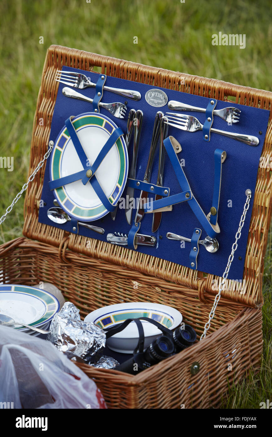 Open picnic hamper, at an outdoor music concert at Blickling Hall, Norfolk, in July. The event, called the 'Greatest 80s Party', featured bands and singers from the 1980s. Stock Photo