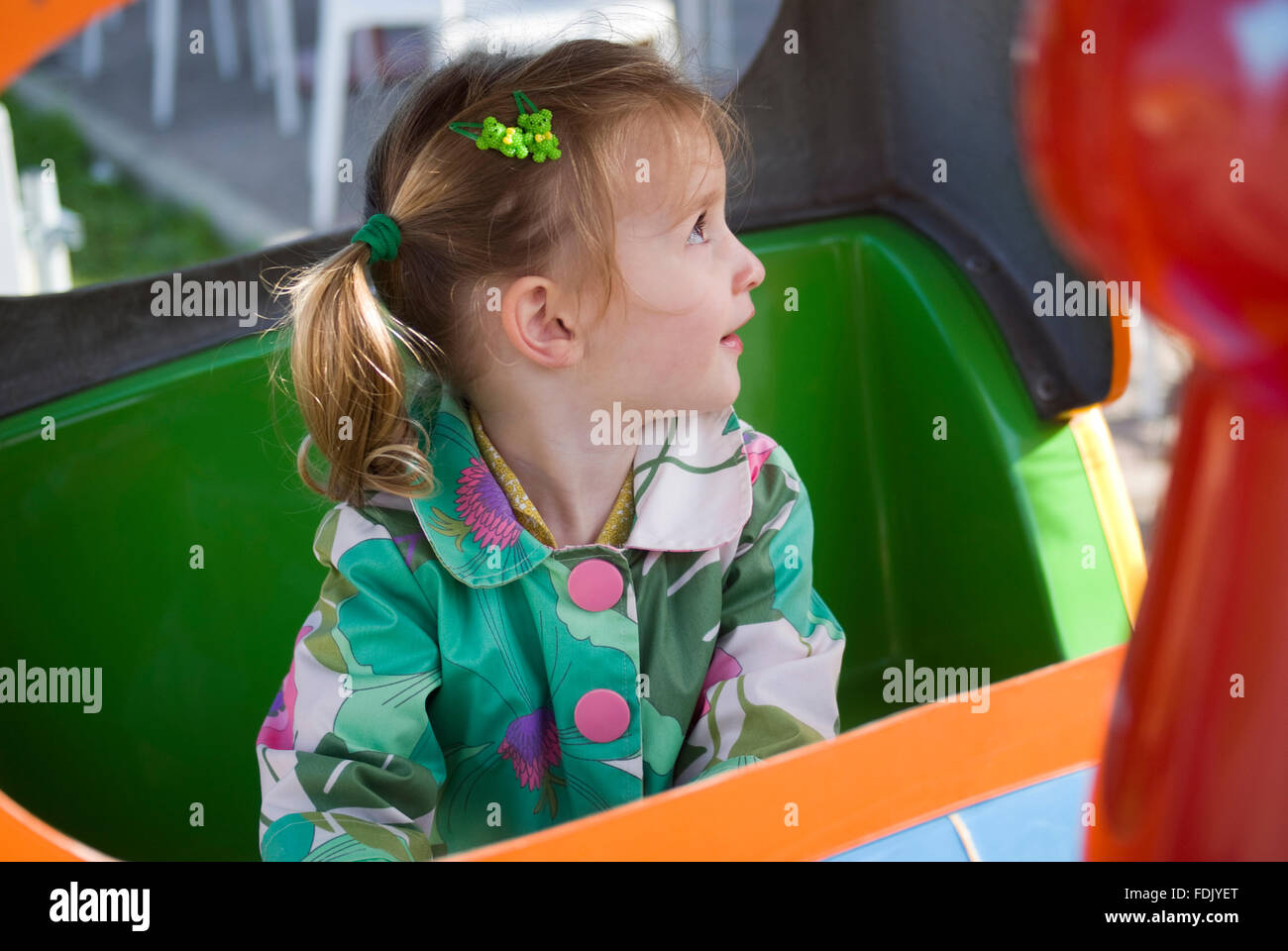 Happy little girl on the playground Stock Photo - Alamy