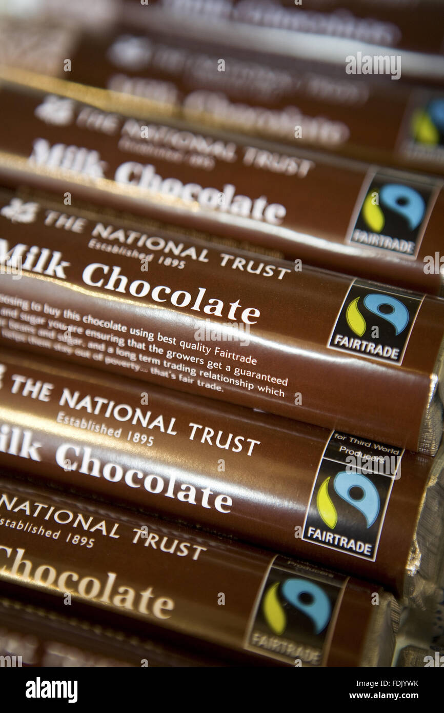 Fairtrade milk chocolate bars on sale in the National Trust shop at Polesden Lacey, Surrey. Stock Photo
