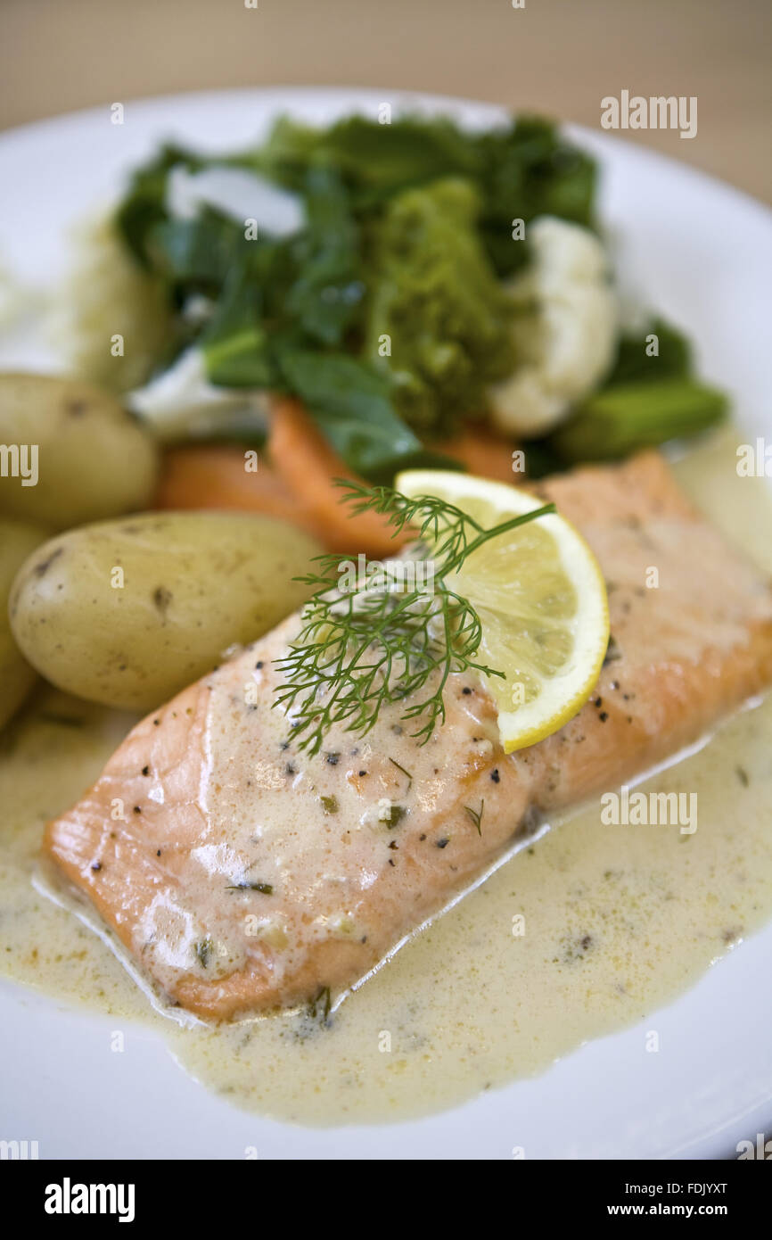 Salmon and vegetables, available in the restaurant at Polesden Lacey, Surrey. Stock Photo