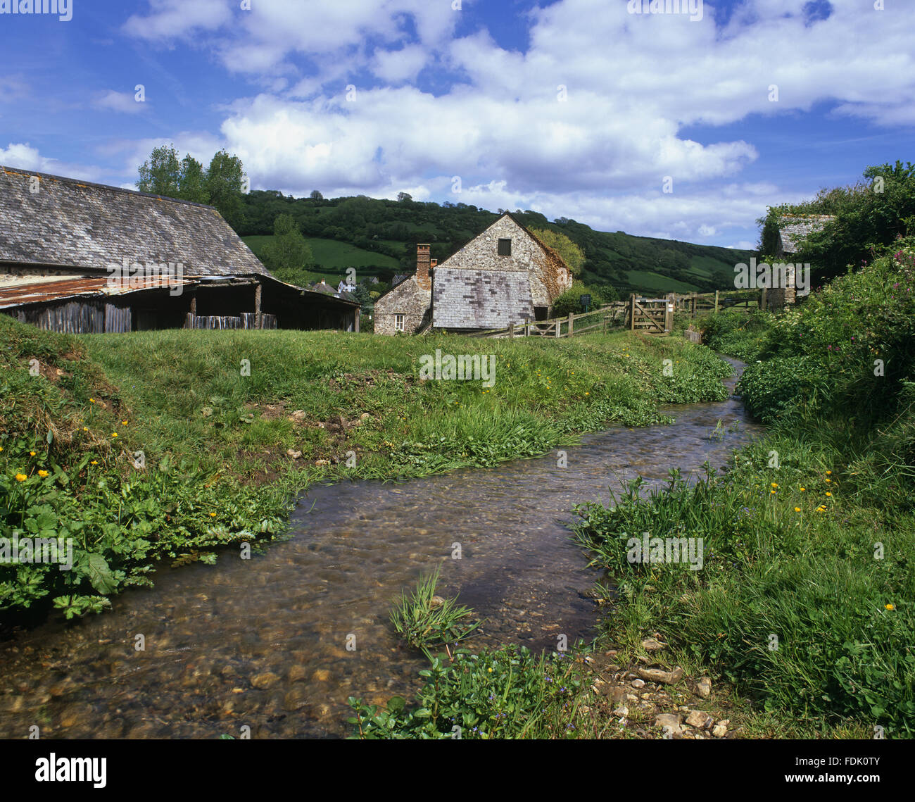 Water-powered Manor Mill at Branscombe, Devon. The Mill is restored to working order and originally would have supplied flour to the bakery. Stock Photo
