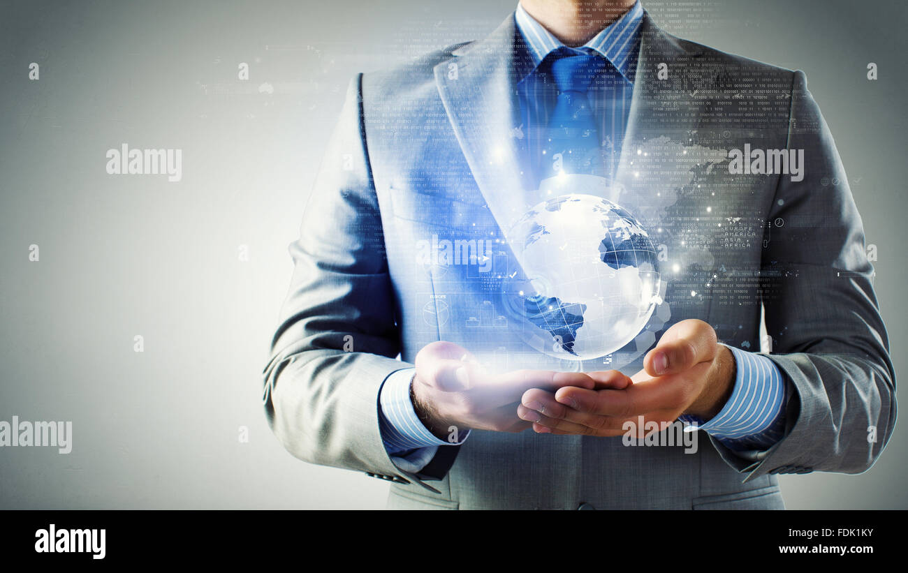 Close up of businessman holding digital globe in palm Stock Photo - Alamy