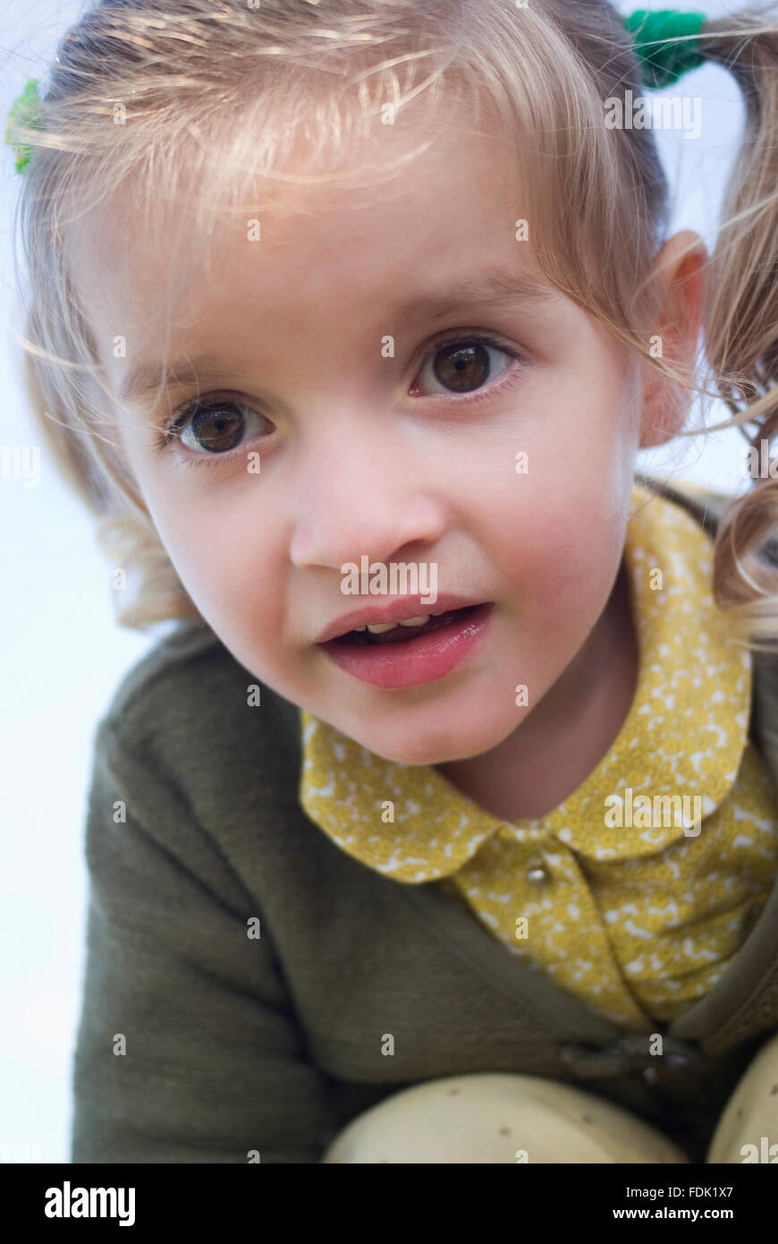 Child girl smiling at the camera Stock Photo - Alamy