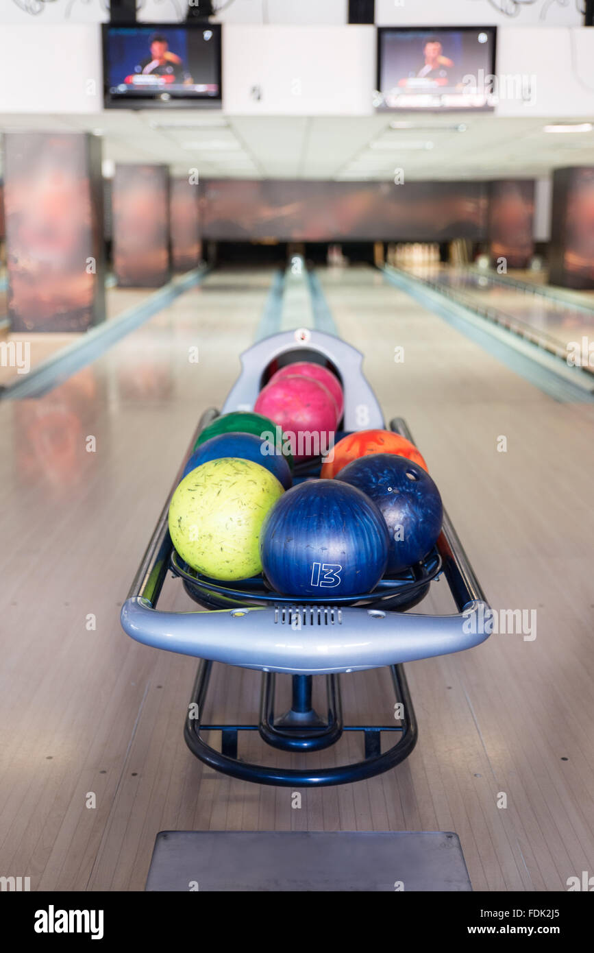 Bowling balls in bowling ball rack Stock Photo Alamy