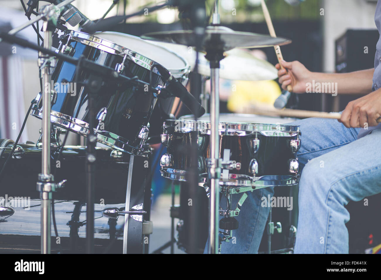 Close-up of a man playing drums Stock Photo