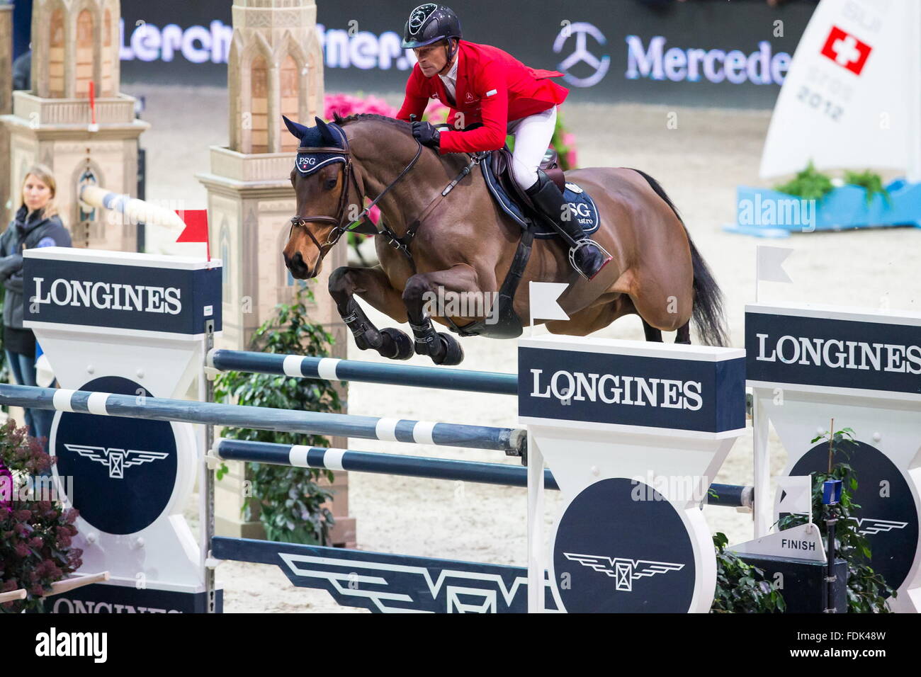 (160201) -- ZURICH, Feb. 1, 2016 (Xinhua) -- Swiss Pius Schwizer competes at the Longines FEI World Cup Jumping Western European League in Zurich, Switzerland, on Jan. 31, 2016. Pius Schwizer claimed the champion. (Xinhua/FEI/Tony Parkes) Stock Photo