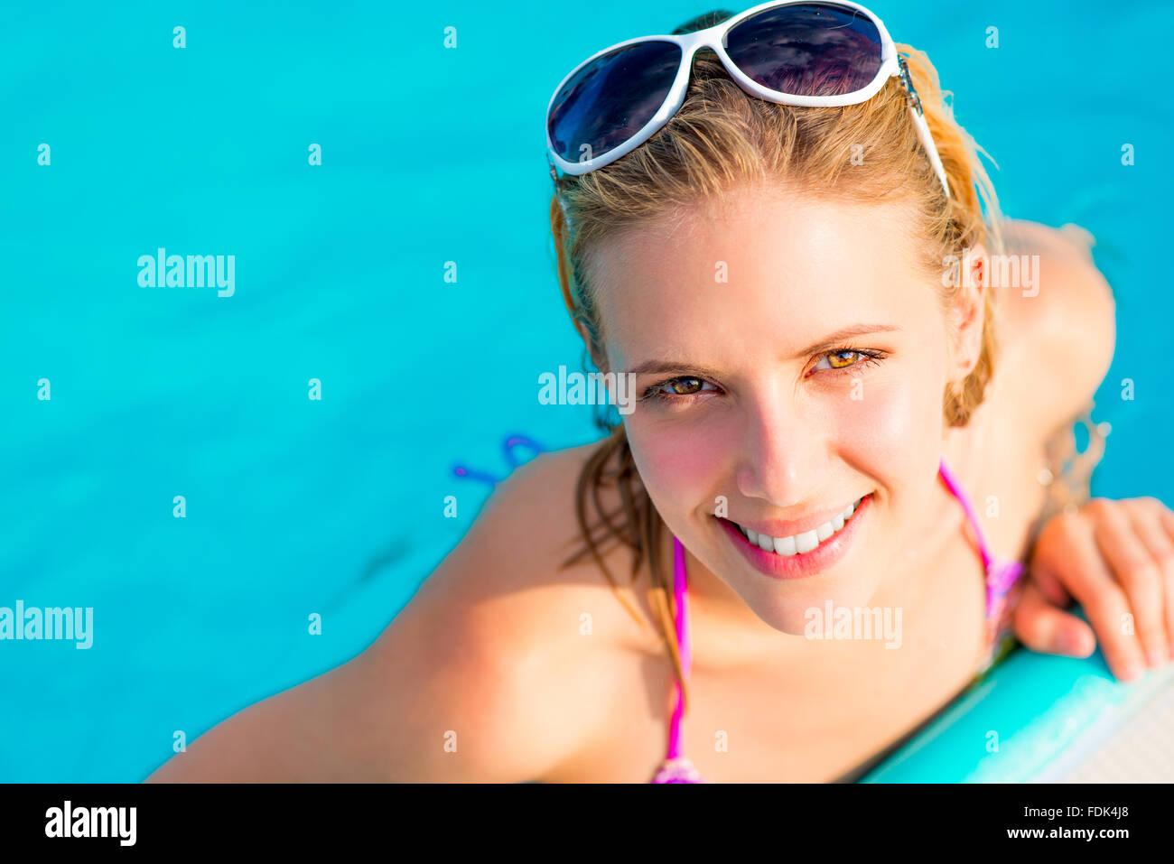 beautiful-young-woman-in-the-swimming-pool-stock-photo-alamy