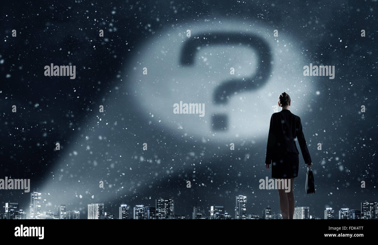 Question Back Businesswoman standing with back and looking at question mark concept ...