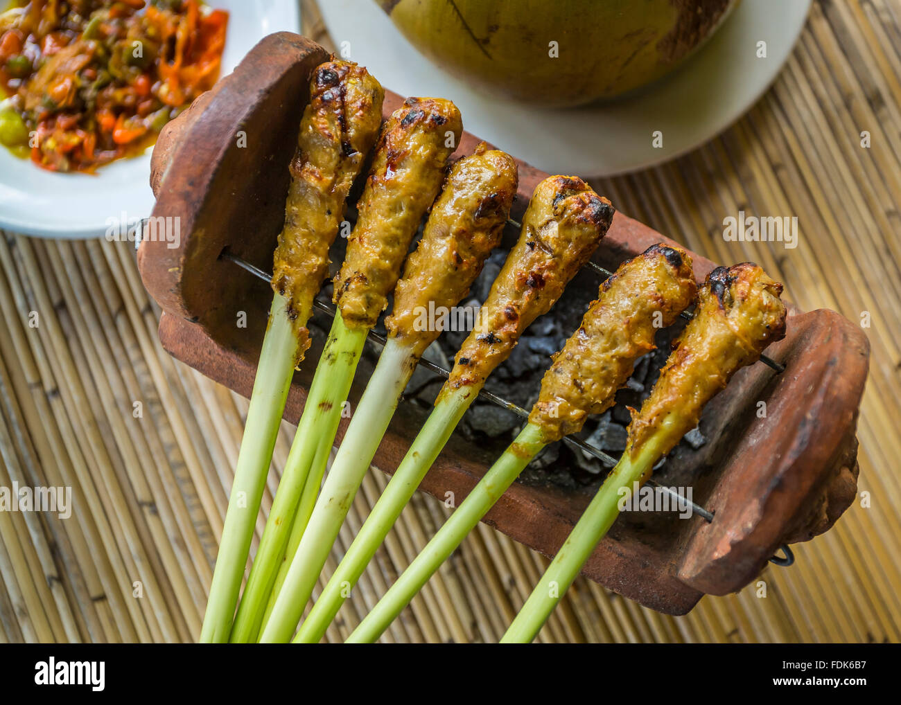 Satay meat roasting on lemongrass skewers, Bali, Indonesia Stock Photo