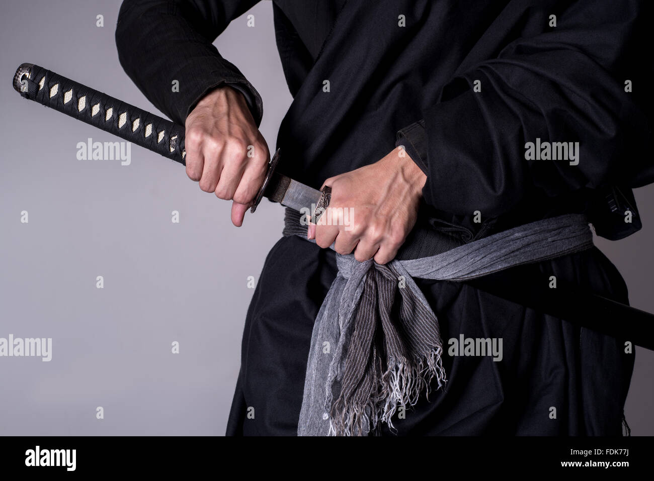 Man with Katana sword Stock Photo - Alamy