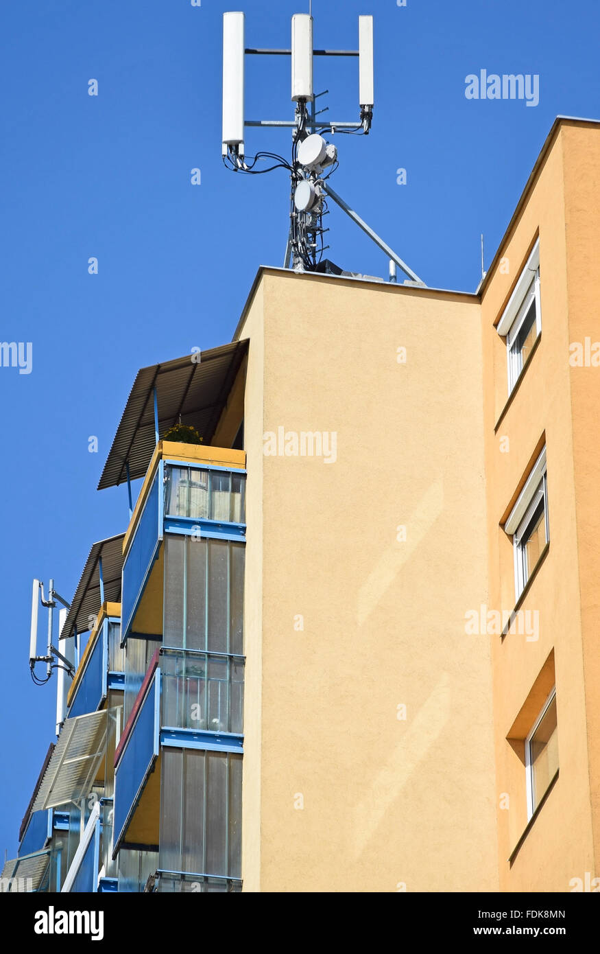 Antennas on the top of a high apartment building Stock Photo Alamy