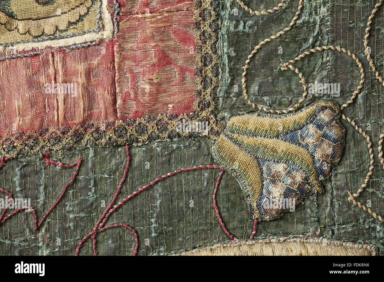 Close view of part of the Marian hangings at Oxburgh Hall, Norfolk. The needlework panels were made about 1569-84 by Mary, Queen of Scots and Bess of Hardwick during the time of Mary's imprisonment at Tutbury Castle. The small applique panels are worked i Stock Photo