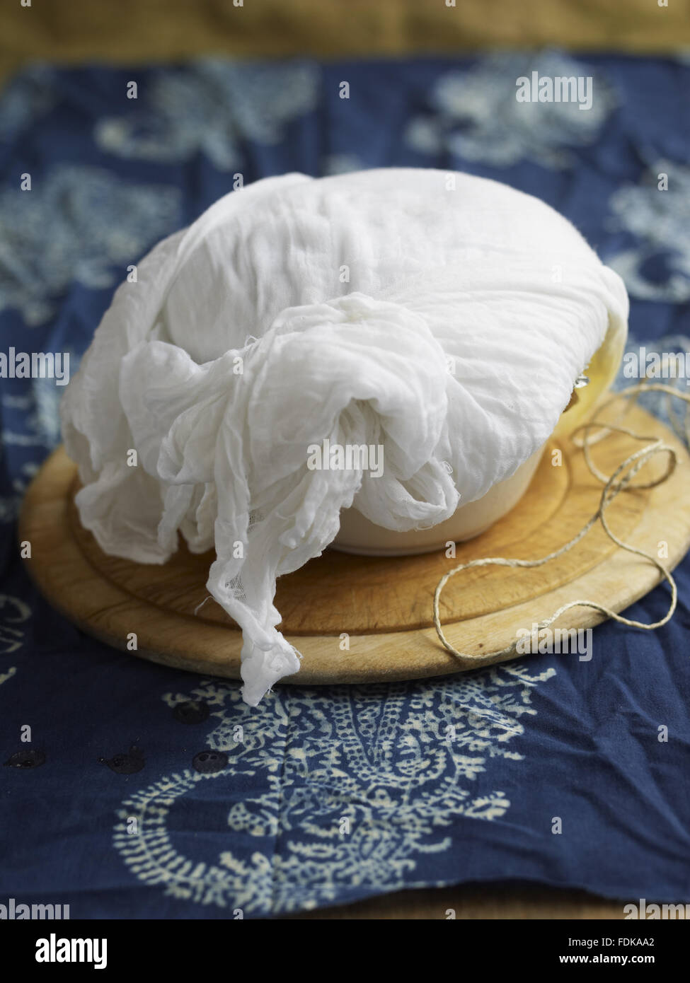 Beef pudding wrapped in a muslin, one of the traditional dishes served in National Trust restaurants. Stock Photo