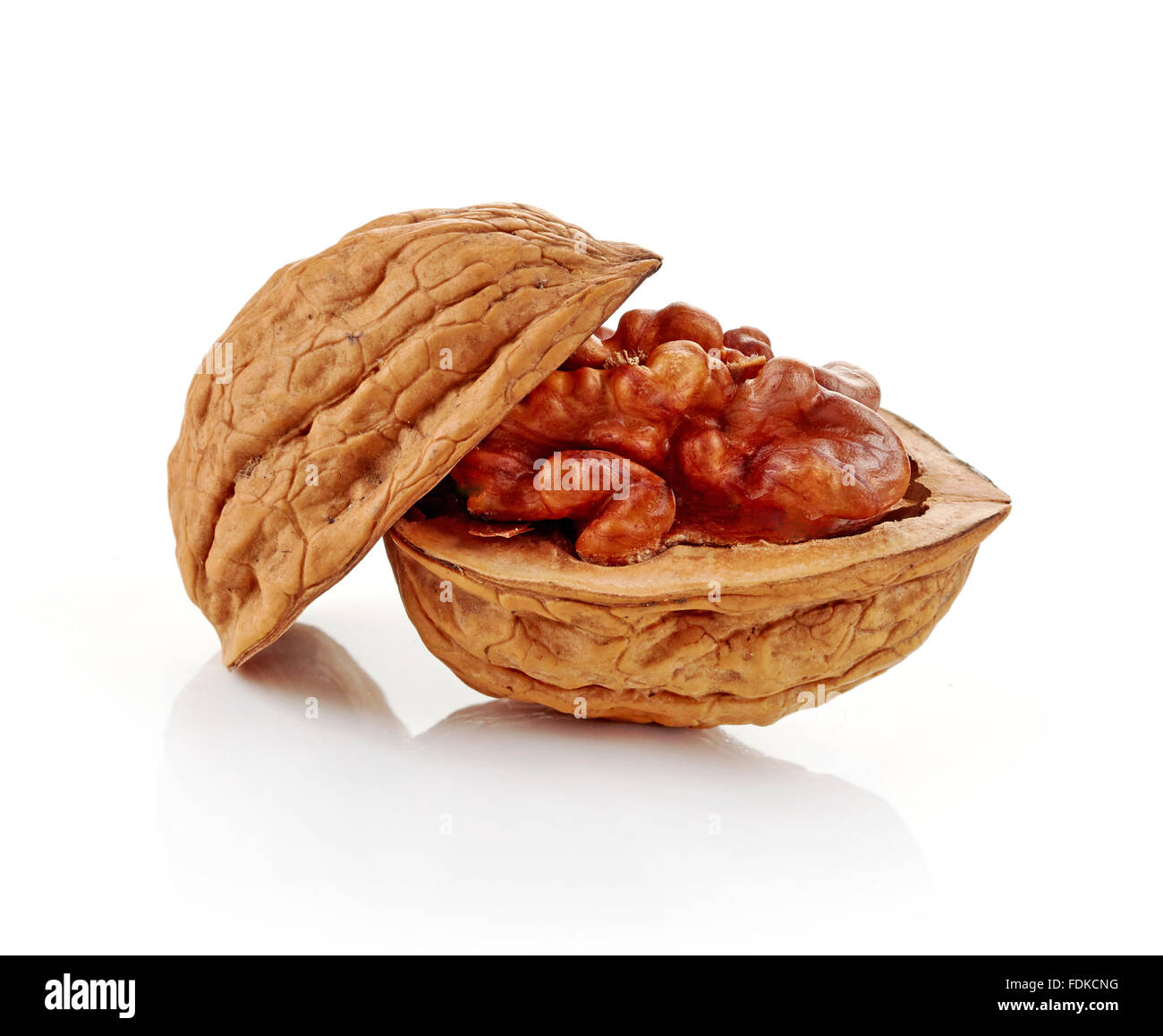 Cracked walnut on white background, isolated, closeup Stock Photo