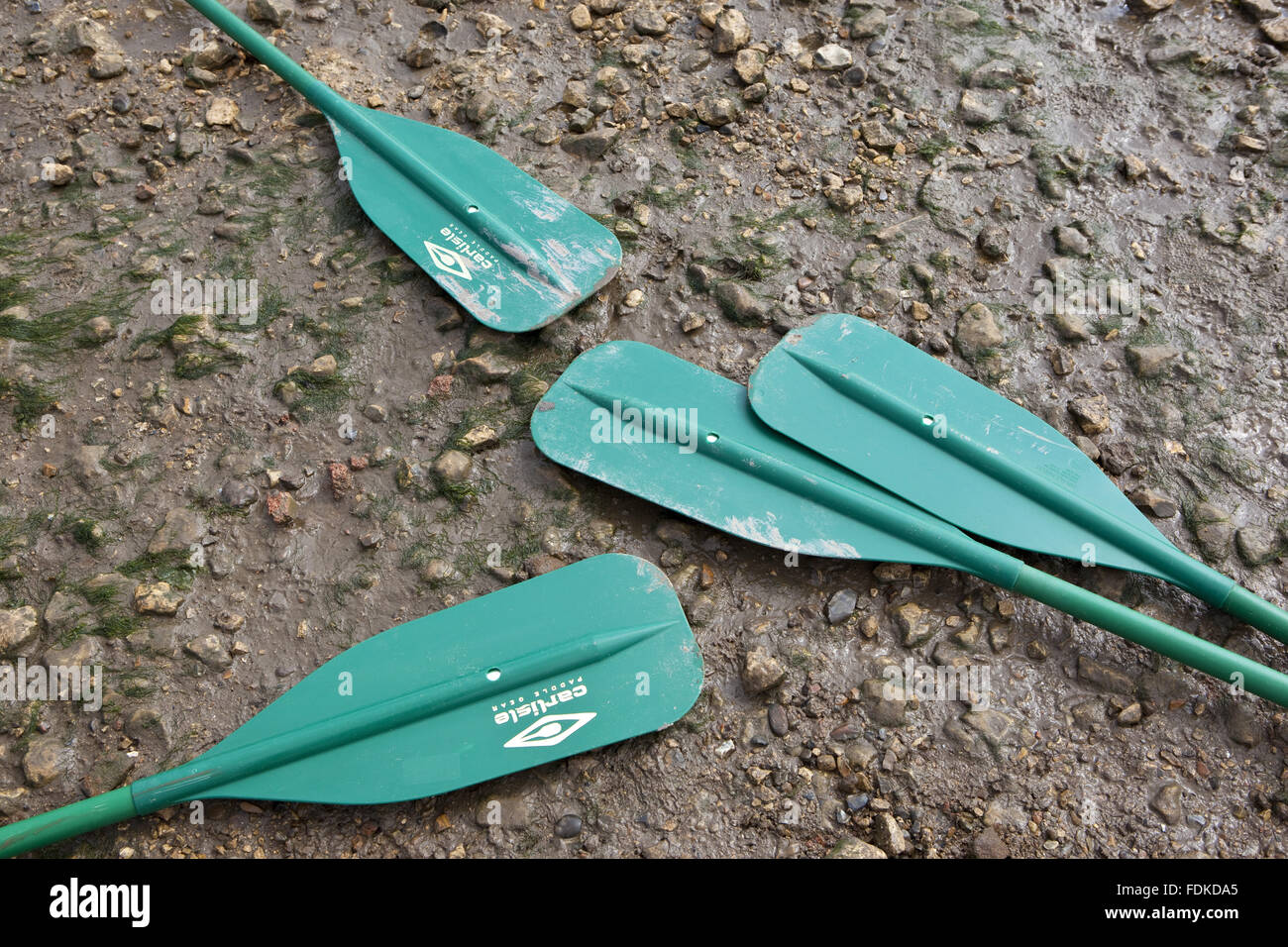 Paddles on the shore at Brancaster, Norfolk. Stock Photo