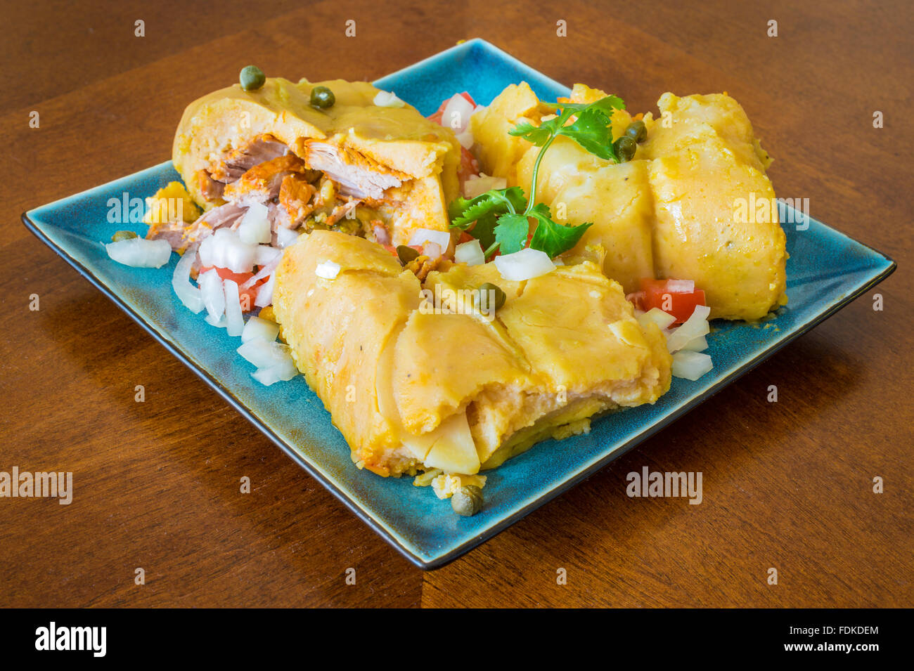 yellow traditional Nacatamal or tamale, Latin American dish stuffed