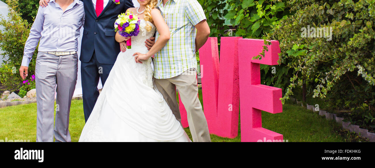 The bride and groom, and guests Stock Photo Alamy