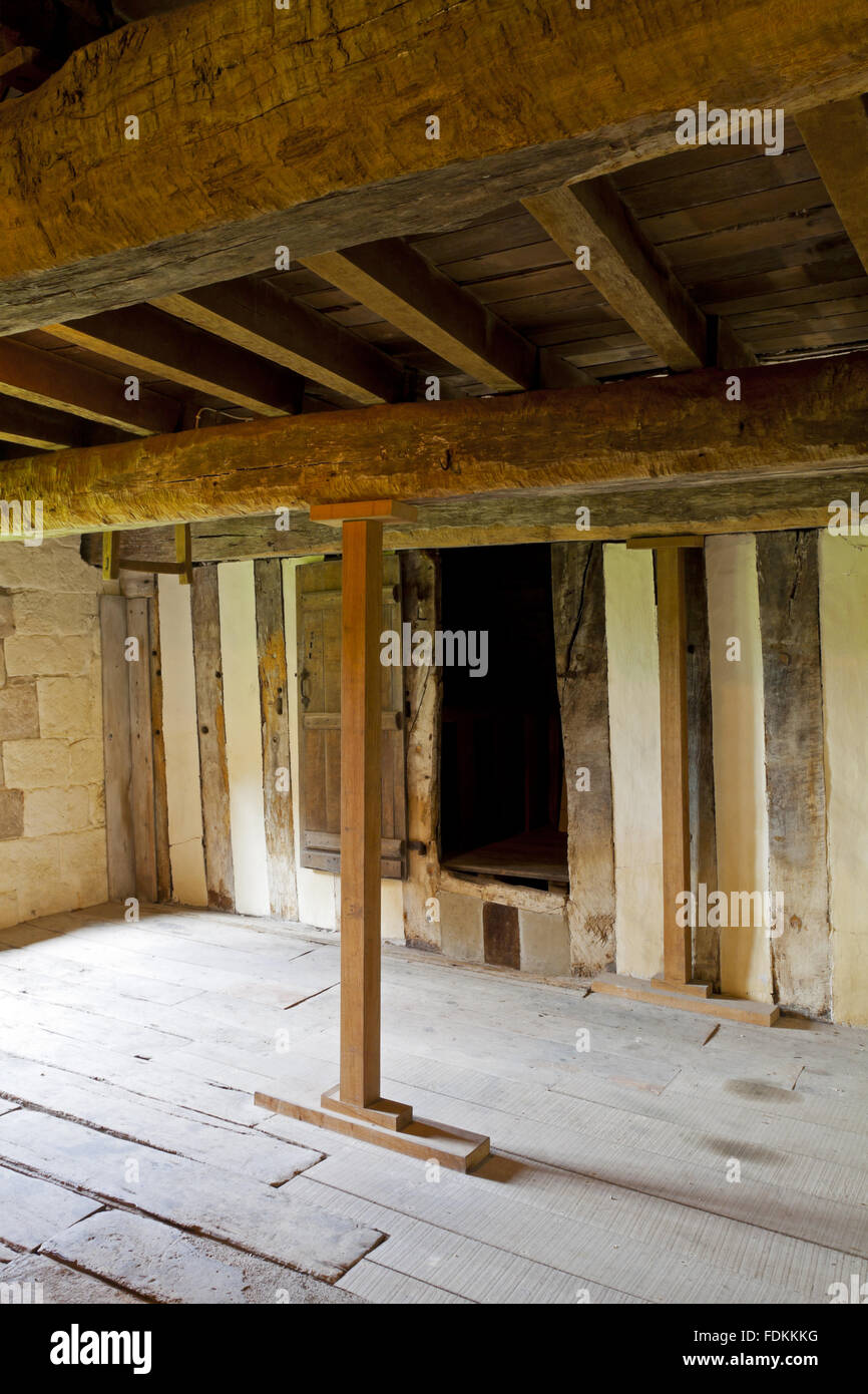 The undercroft or ground floor of The Old Manor, Norbury, Derbyshire, with seventeenth century post and panel partitions. Stock Photo