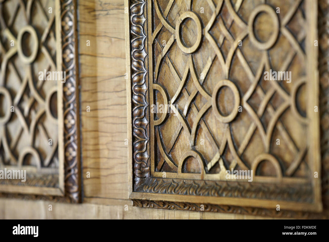 Detail of a burr walnut veneered door to the Chinese Room, c.1760, with geometric tracery design at Claydon, Buckinghamshire. Stock Photo