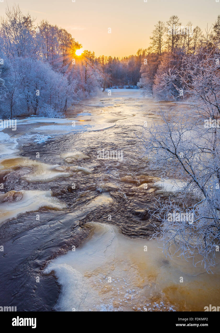 Sunrise in cold winter river landscape Stock Photo